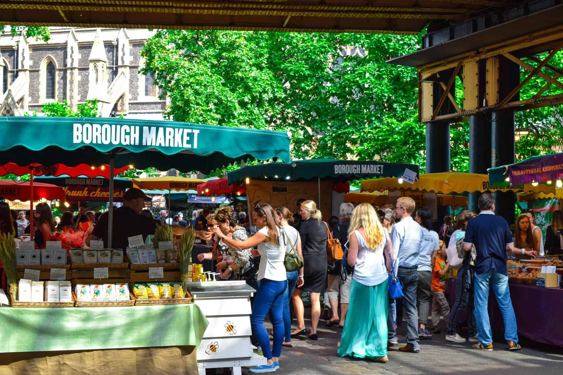 people walking in market, as a way to eat a sustainable diet