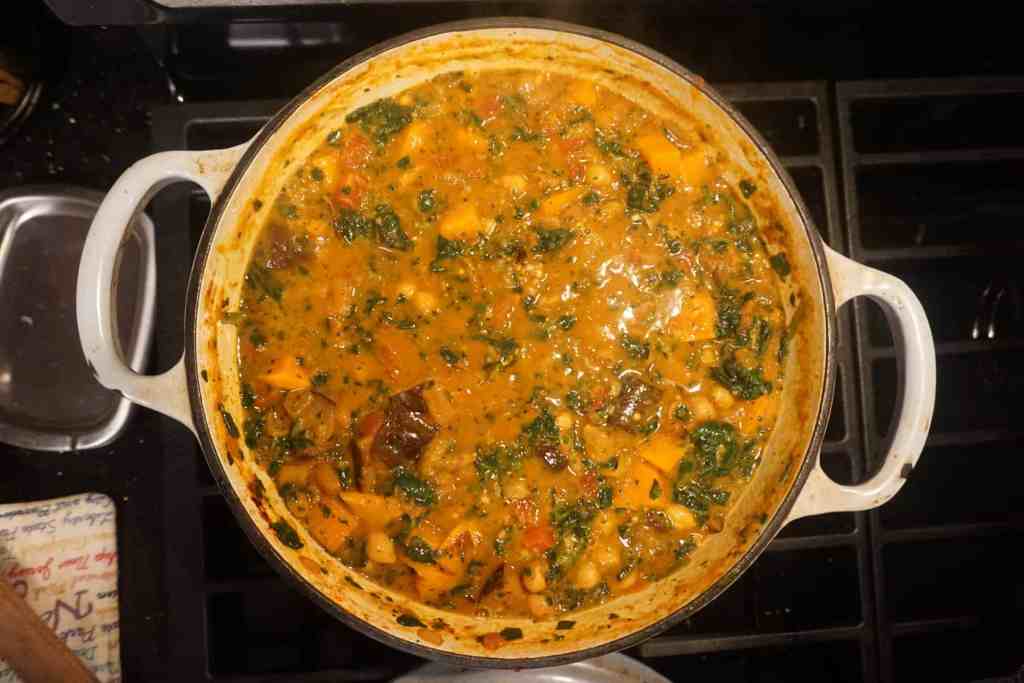 overhead shot of healthy soup recipe with sweet potato and chickpea stew loaded with other vegetables