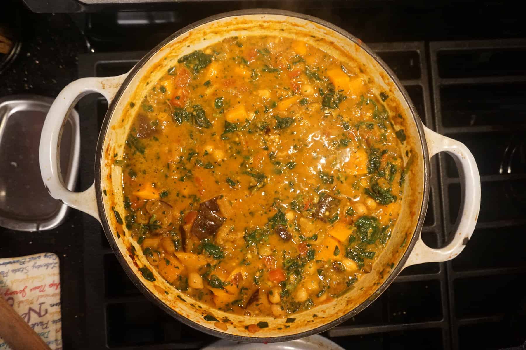 overhead shot of sweet potato and chickpea stew loaded with other vegetables