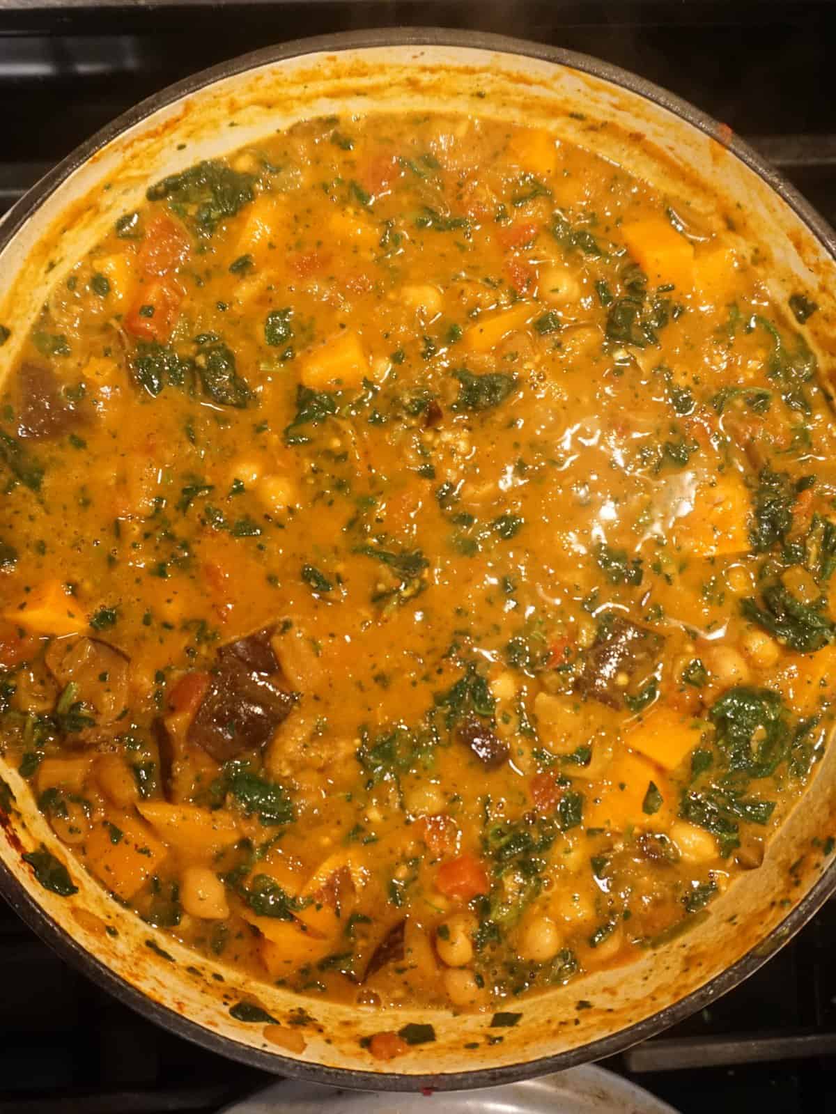 overhead shot of sweet potato and chickpea stew loaded with other vegetables makes sustainable food choices
