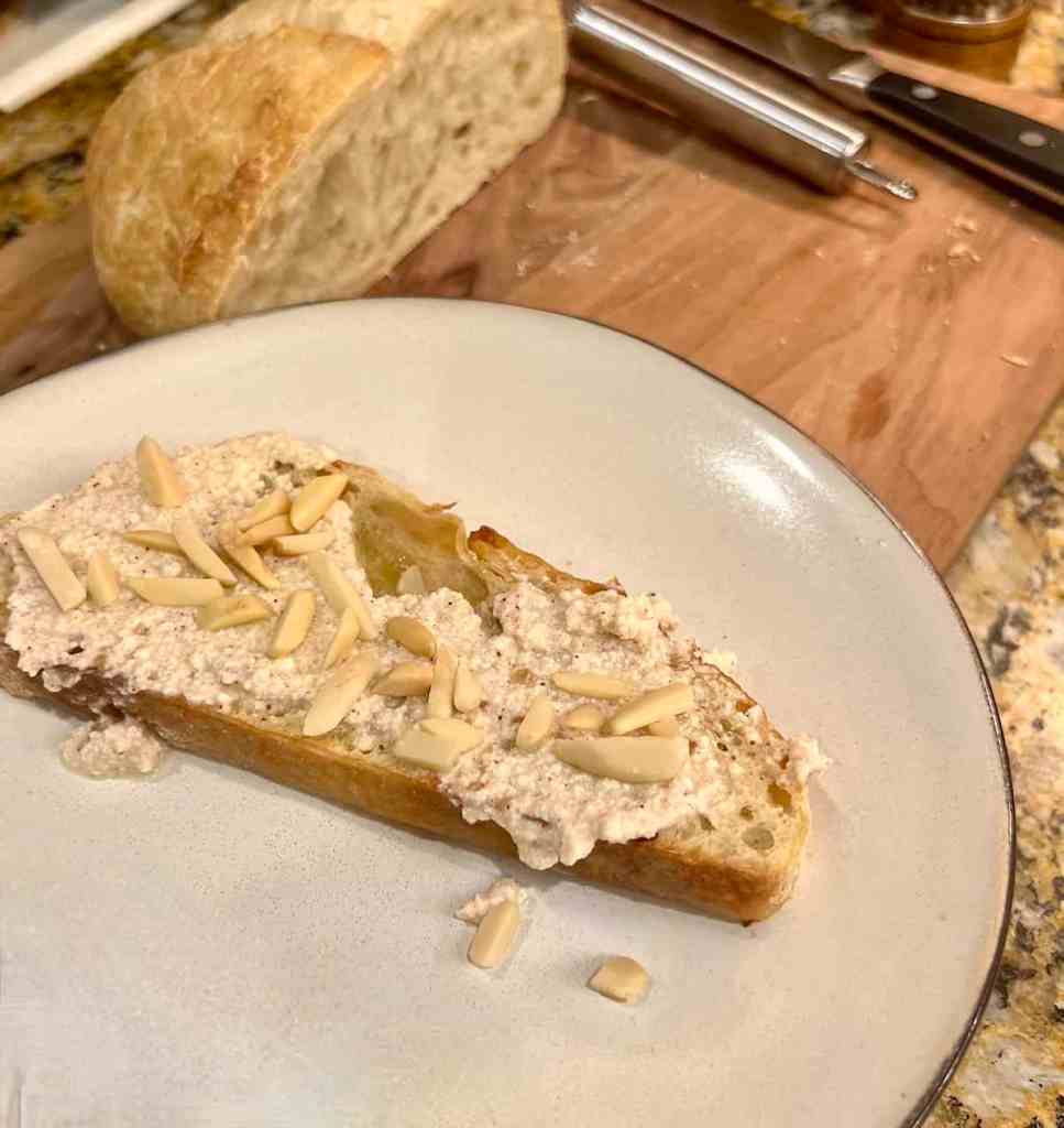 Sweetened Ricotta toast with slivered almonds
