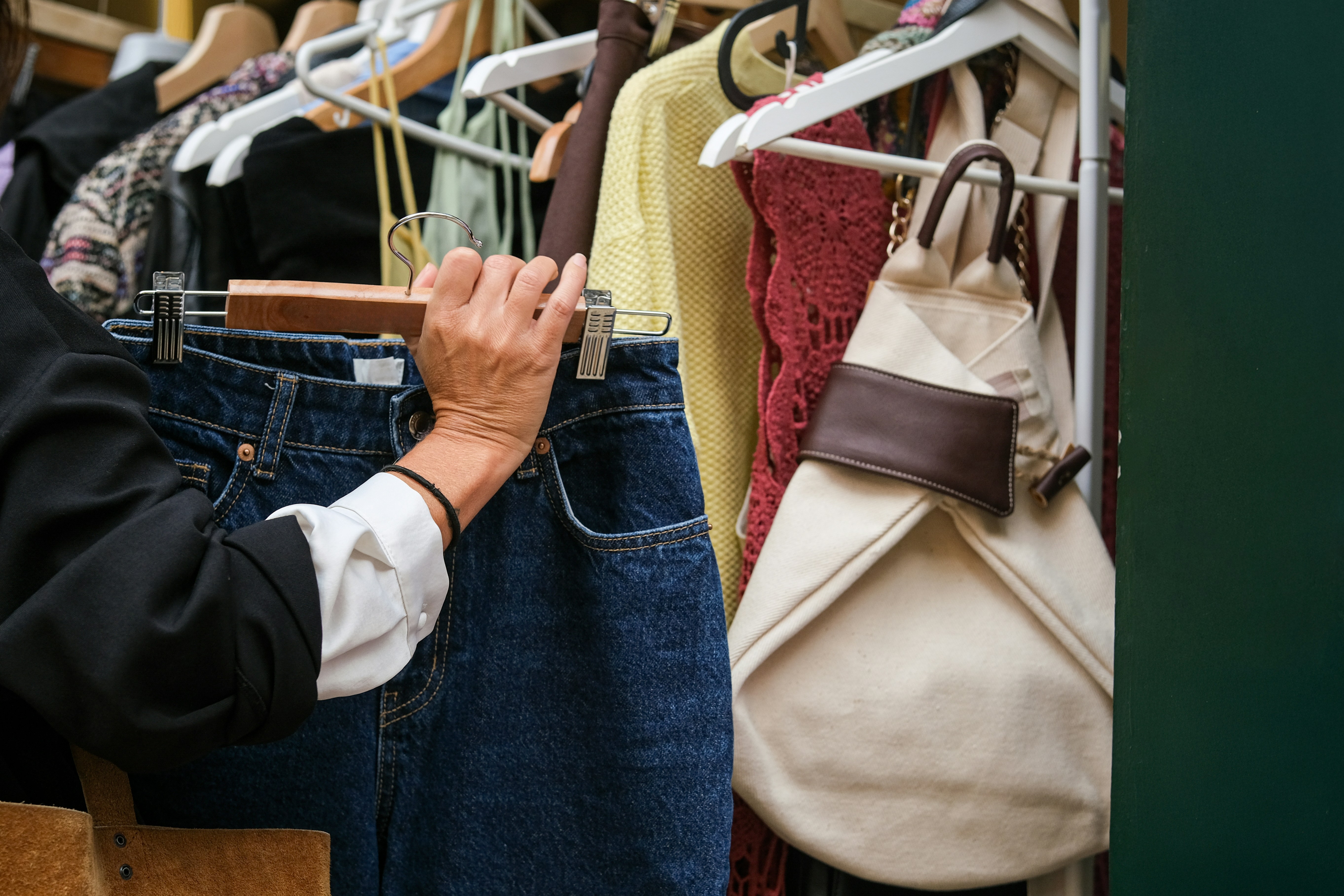 woman shopping at thrift store - best thrift shops in nj