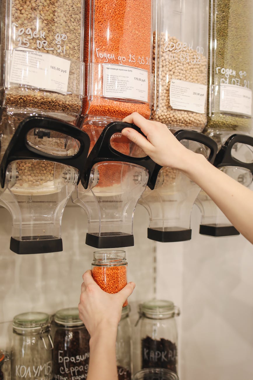 person purchasing lentils at a grocery store